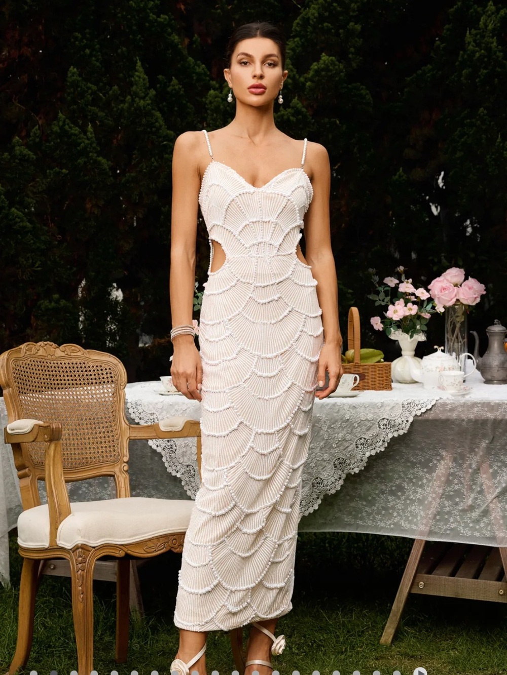 Elegant White Beaded Sheath Dress with Cutouts